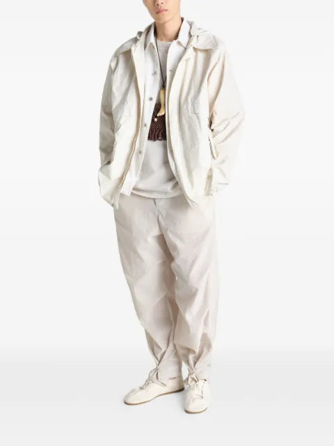 LEMAIRE rain jacket with detachable hood in coated technical linen
