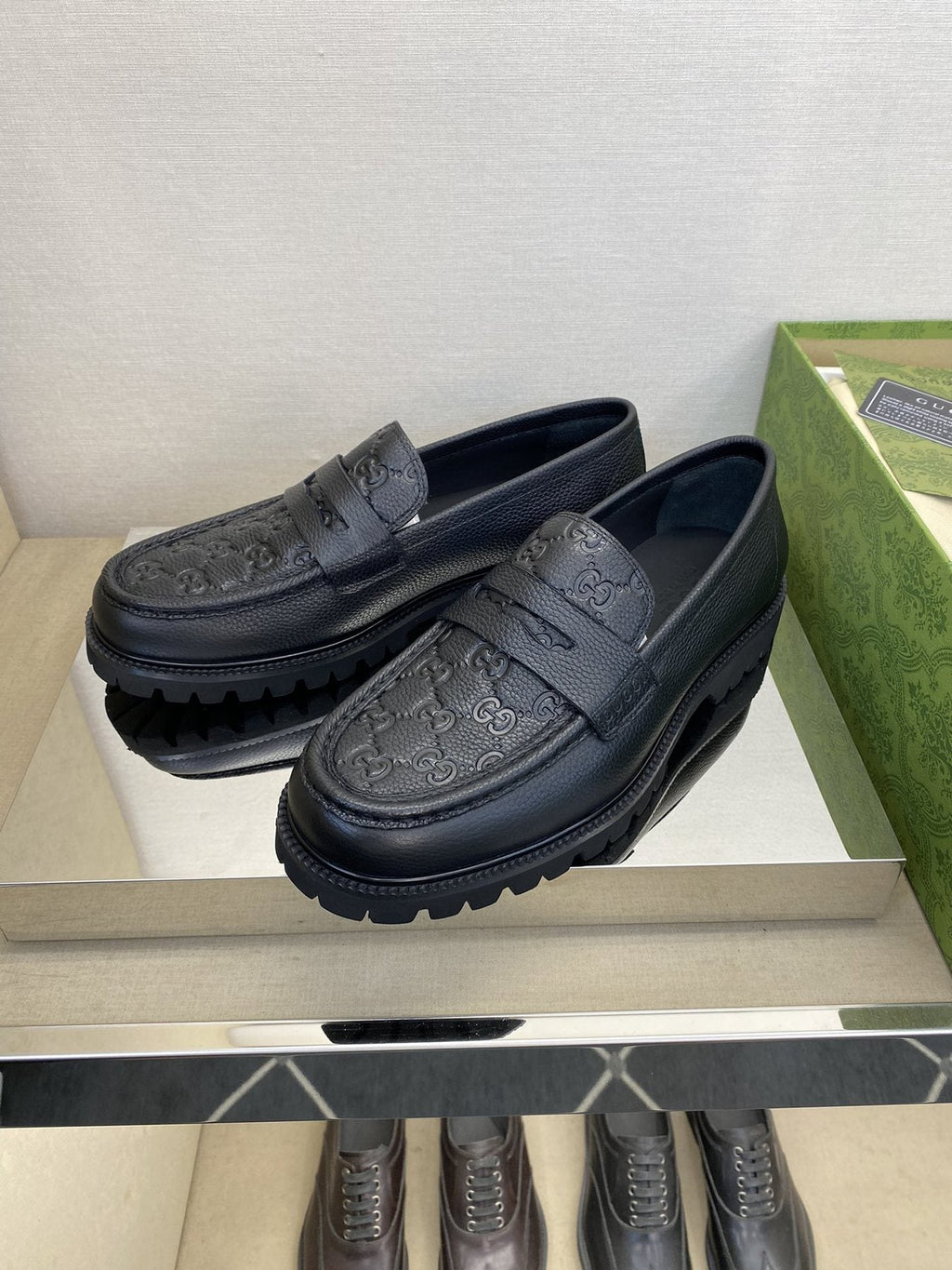 Gucci Men's Black Embossed Lug Sole Loafers